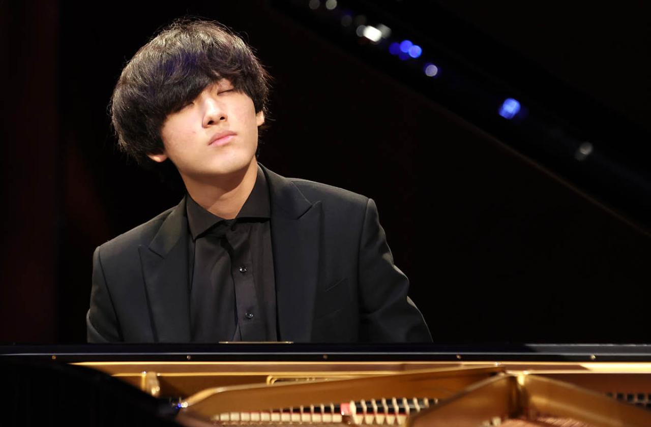 Yunchan eyes closed at piano