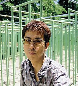 Portrait photograph of Susumu Yokota
